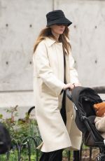 JENNIFER LAWRENCE Dons a Trenchcoat for a Stroller Stroll in New York City 04/30/2026