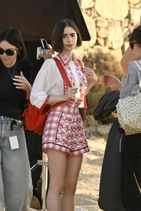 LILY COLLINS on the Set of Emily in Paris at Mykonos in Greece 05/20/2026