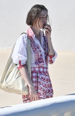LILY COLLINS on the Set of Emily in Paris in Mykonos 05/18/2026
