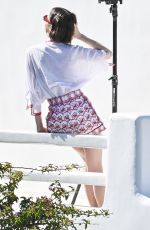 LILY COLLINS on the Set of Emily in Paris in Mykonos 05/18/2026