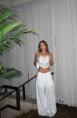 LUANA BARRON Promotes Saint Laurent in a White Dress Out in Miami 05/12/2026