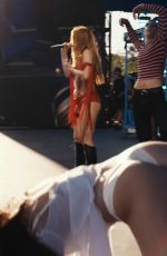 MADDIE ZIEGLER on stage with ADDISON RAE at Coachella 2026 in Indio 04/18/2026
