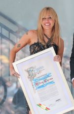 MILEY CYRUS at Her Hollywood Walk of Fame Star Ceremony in Hollywood 05/22/2026