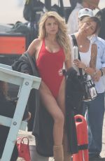 BROOKS NADER in a Red Swimsuit on the Set of Baywatch Reboot in Long Beach 06/24/2026