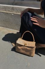 CINDY MELLO Promotes a Balenciaga Rodeo Gandbag, June 2026