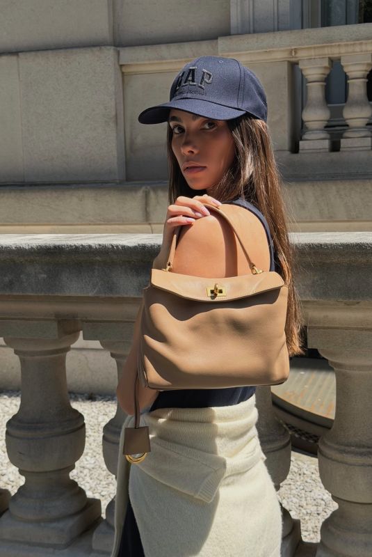 CINDY MELLO Promotes a Balenciaga Rodeo Gandbag, June 2026
