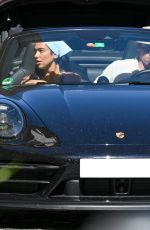 DUA LIPA and Callum Turner Leaves Town in a Black Porsche in Rome 06/18/2026