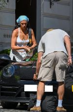 DUA LIPA and Callum Turner Leaves Town in a Black Porsche in Rome 06/18/2026