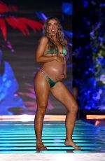Pregnant KATIE AUSTIN at Sports Illustrated Swimsuit Runway Show in Miami Beach 05/30/2026
