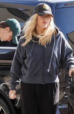 ELLIE GOULDING and Beau Minniear Jet Out of London Ahead of Taylor Swift