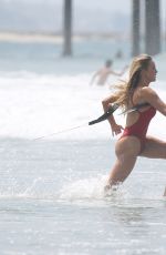 HASSIE HARRISON in a Red Swimsuit on the Set of Baywatch Reboot in Los Angeles 06/30/2026