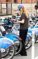 JENNIFER LAWRENCE Looks to Rent a Citi Bike in New York City 07/07/2026