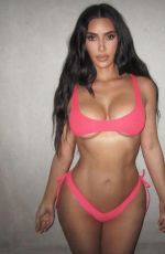 KIM KARDASHIANin Black and Pink Bikini 06/30/2026