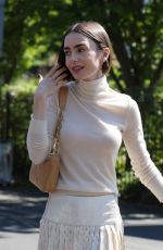 LILY COLLINS at 2026 Wimbledon Tennis Championships in London 07/11/2026