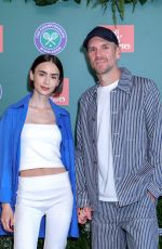 LILY COLLINS at Day Fourteen of 2026 Wimbledon Tennis Championships in London 07/12/2026