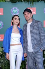 LILY COLLINS at Day Fourteen of 2026 Wimbledon Tennis Championships in London 07/12/2026