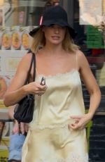MARGOT ROBBIE Out with Family in Paris 07/25/2026
