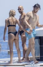 MICHELLE HUNZIKER in Bikini Doing Yoga at a Boat at Aeolian Islands 07/15/2026